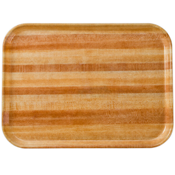 A rectangular wooden tray with stripes on it.