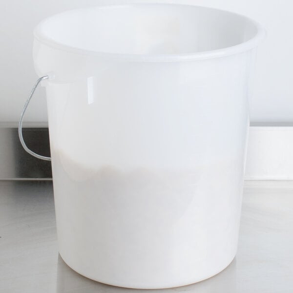 A white Rubbermaid food storage container with a handle.