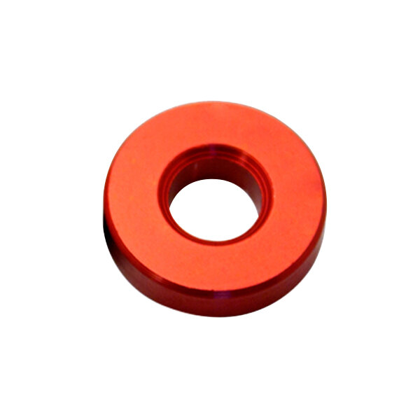 A red round end spacer with a hole in the middle.