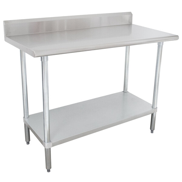 A stainless steel work table with a galvanized undershelf.