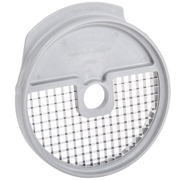 A white circular plastic dicing grid with holes.