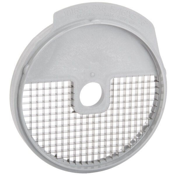 A white circular plastic dicing grid with a hole.