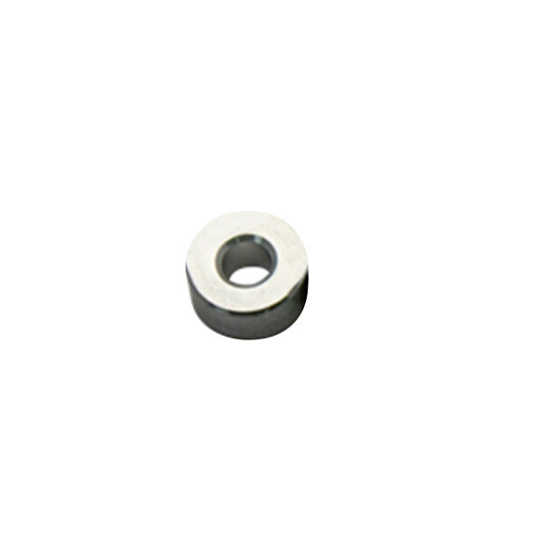 A round silver metal middle spacer with a hole in it.