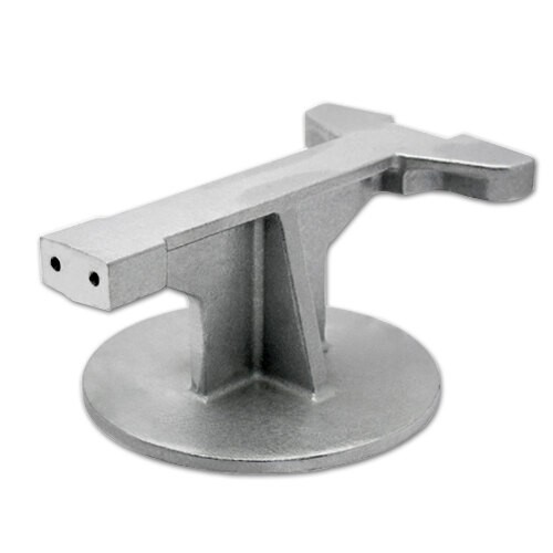 A silver metal Nemco base with a small hole in it.