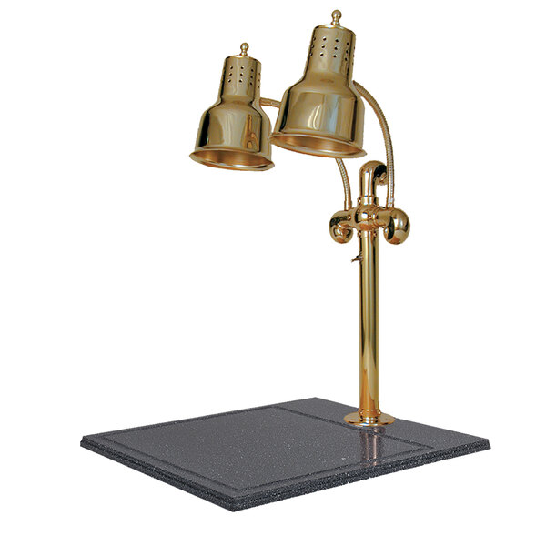 A Hanson Heat Lamps brass carving station with a black synthetic granite base.