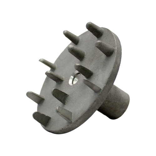 A grey metal drive plate with spikes on it.
