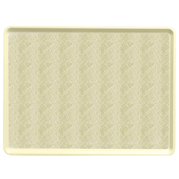 A white rectangular tray with a tan abstract pattern.