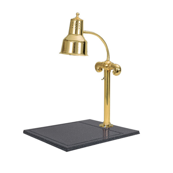 A brass Hanson Heat Lamp with a black synthetic granite base.