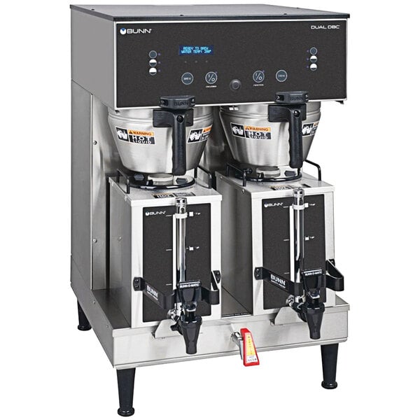A Bunn BrewWISE dual coffee machine stand with two coffee machines on it.