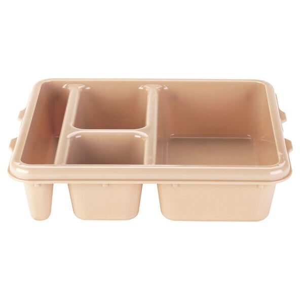 A beige Cambro plastic meal delivery tray with 4 compartments.