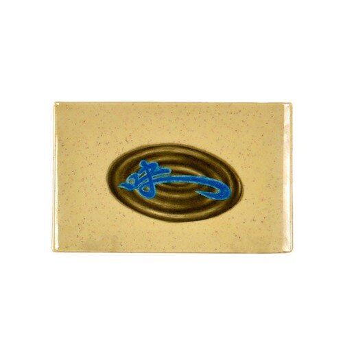 A rectangular beige melamine plate with a blue swirly design.