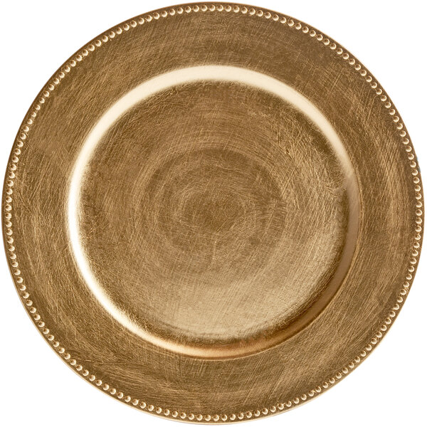 A Charge It by Jay gold plastic charger plate with beaded trim.