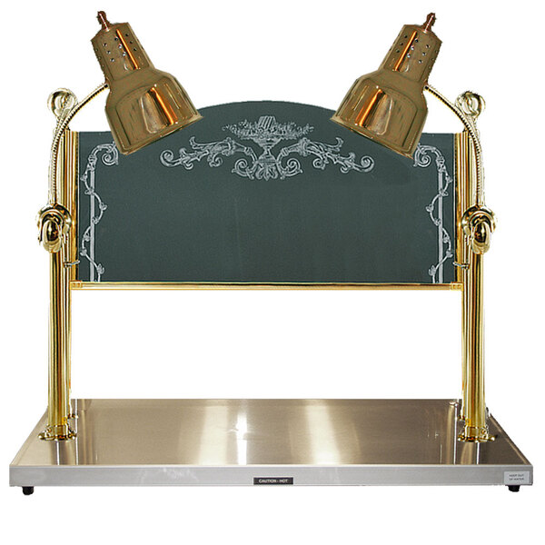 A Hanson Heat Lamps brass carving station with two lamps over a metal surface.