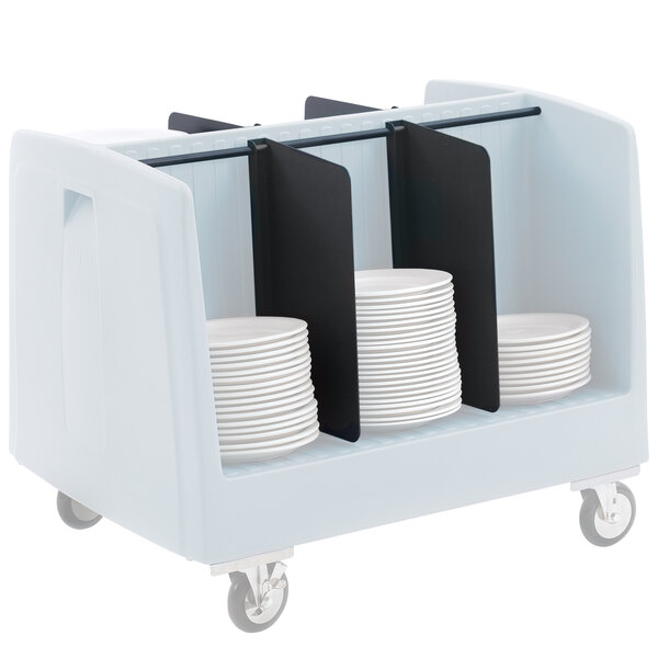 A white plastic divider assembly in a cart with plates on it.