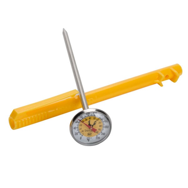 A Taylor yellow pocket probe dial thermometer.