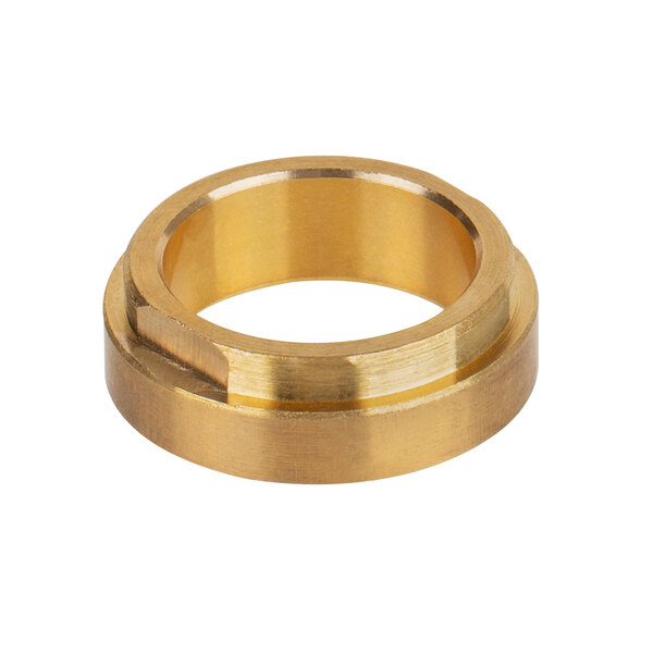 A gold bronze gear bearing with a hole in the center.
