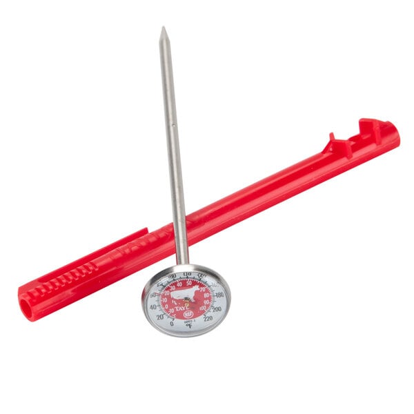 A Taylor pocket probe thermometer with a red handle and metal pole.