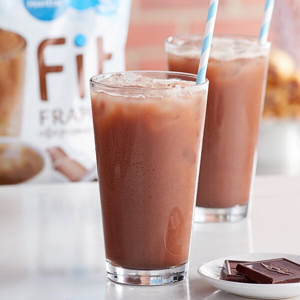 Two glasses of Big Train Fit Frappe Mocha protein drink.
