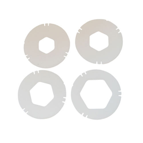 A group of white circular gaskets with hexagonal centers.