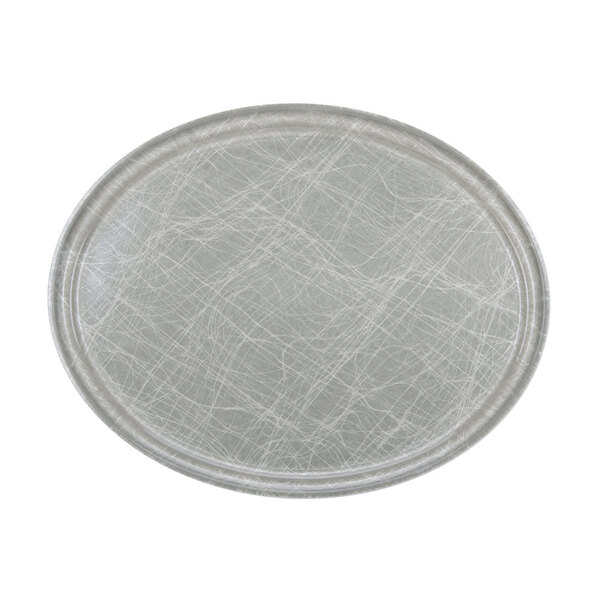 A white oval Cambro Camtray with a gray abstract design.