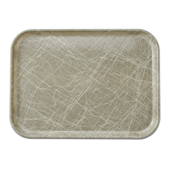 A rectangular Cambro tray with an abstract gray design on a white surface.