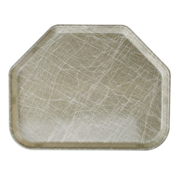A gray trapezoid-shaped Cambro tray with a white abstract design.