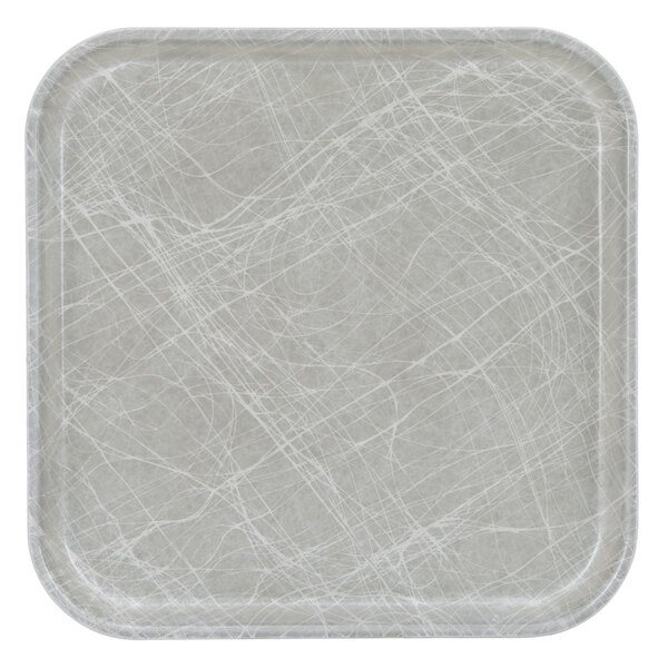 A square white Cambro tray with a gray abstract pattern.