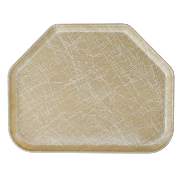 A tan fiberglass trapezoid tray with a white surface.