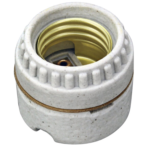 A white ceramic lamp socket with a gold metal ring.