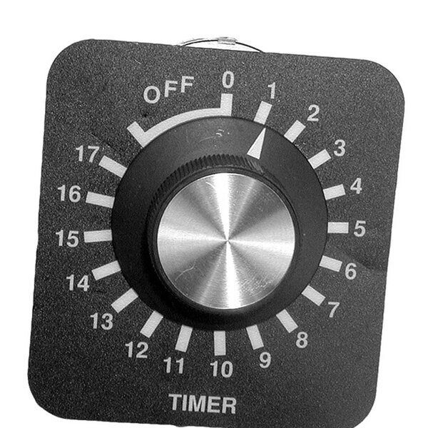 A close-up of a black and silver timer dial plate.