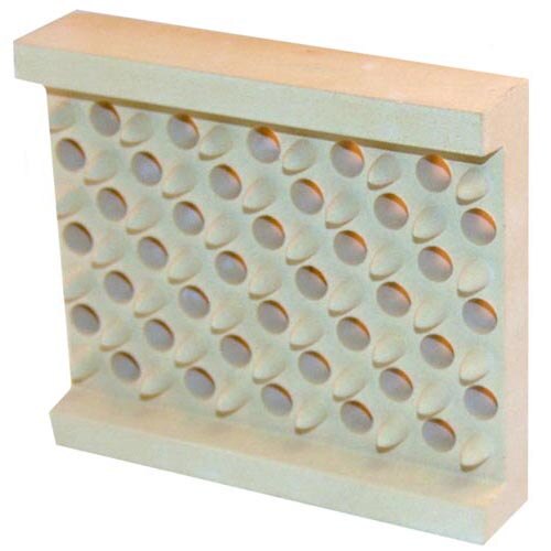 A white rectangular ceramic block with holes.