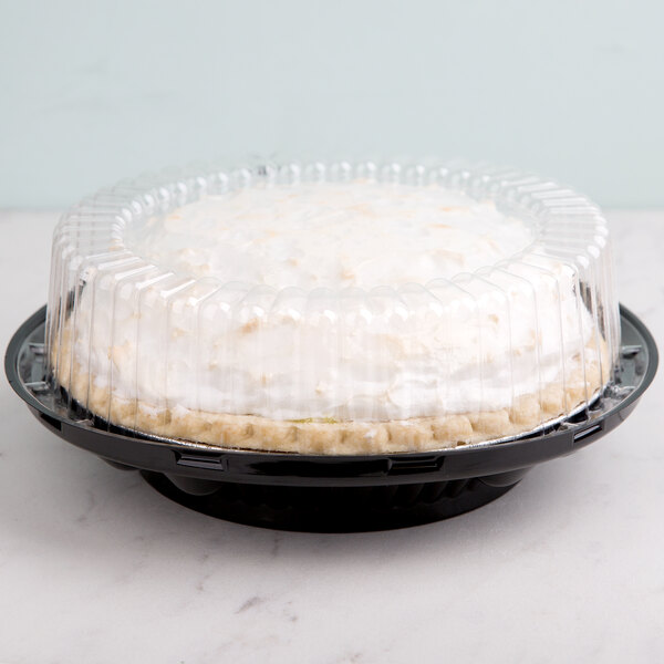 A pie in a D&W Fine Pack plastic container with a clear high dome lid.