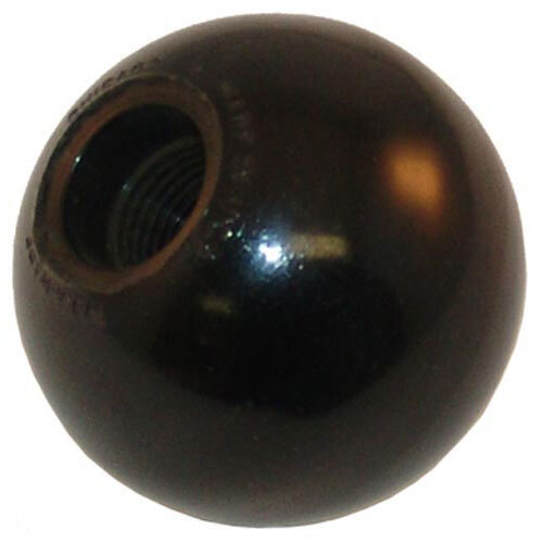A black ball with a metal nut on it.