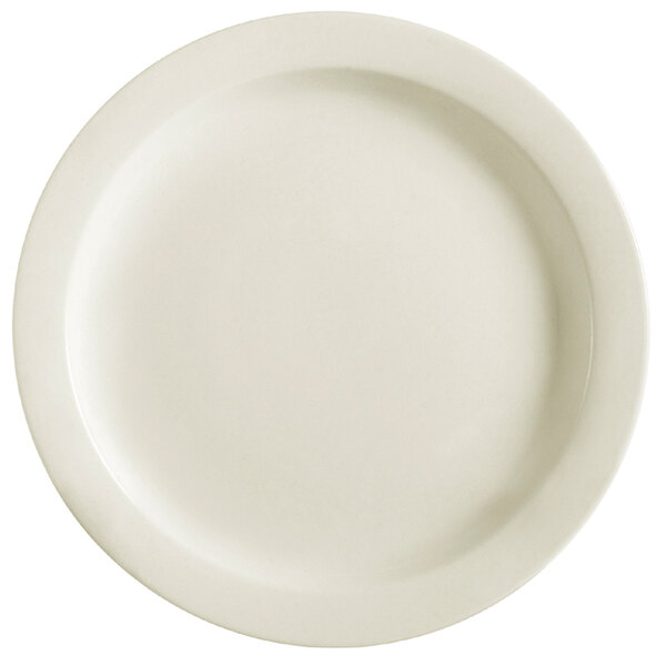 A CAC ivory china plate with a white rim.