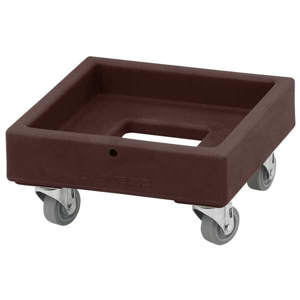 A brown rectangular plastic dolly with wheels.