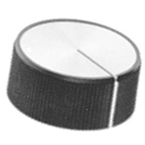 A close-up of a black and white circular object with a white stripe on it.