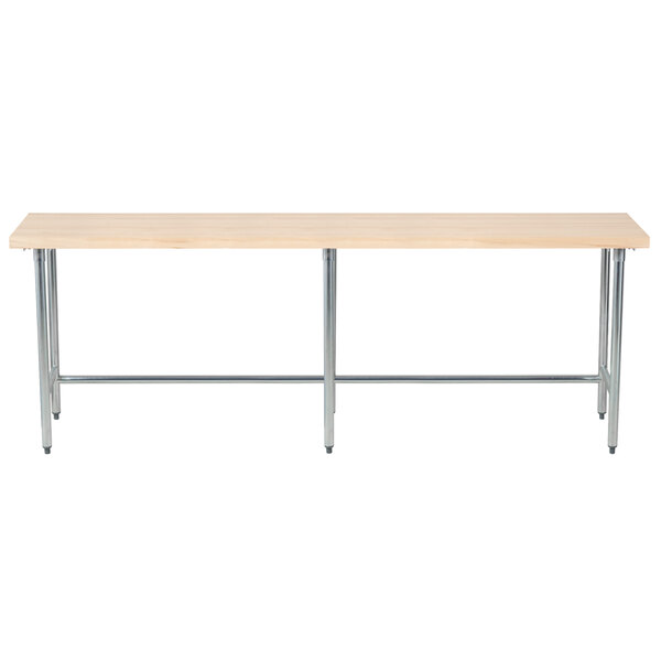 A long wood table with a galvanized metal base.