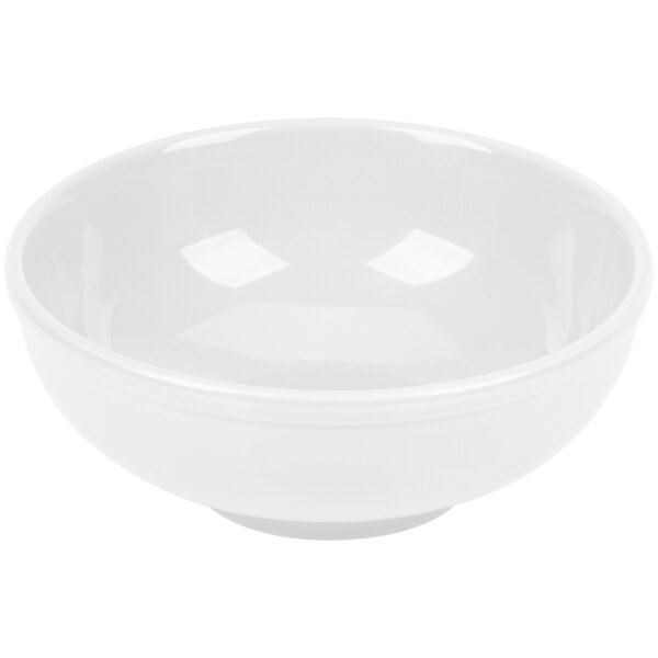 A white CAC Festiware salad/pasta bowl on a white surface.