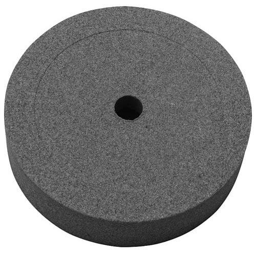 A grey circular sharpening stone with a hole in the center.