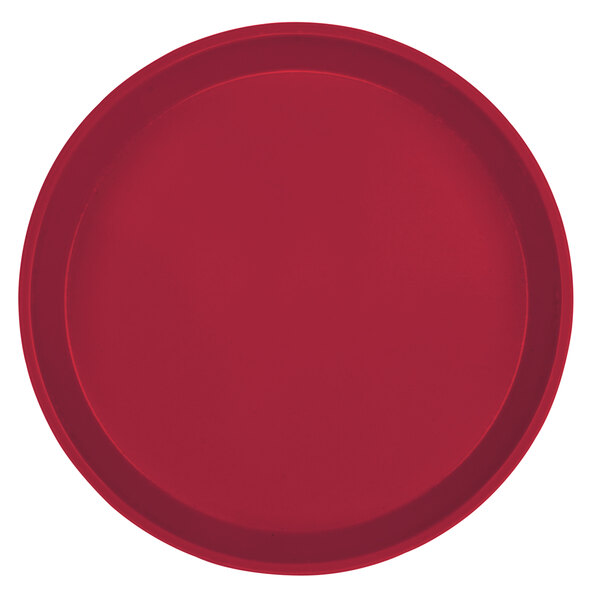 A close-up of a red round Cambro tray.