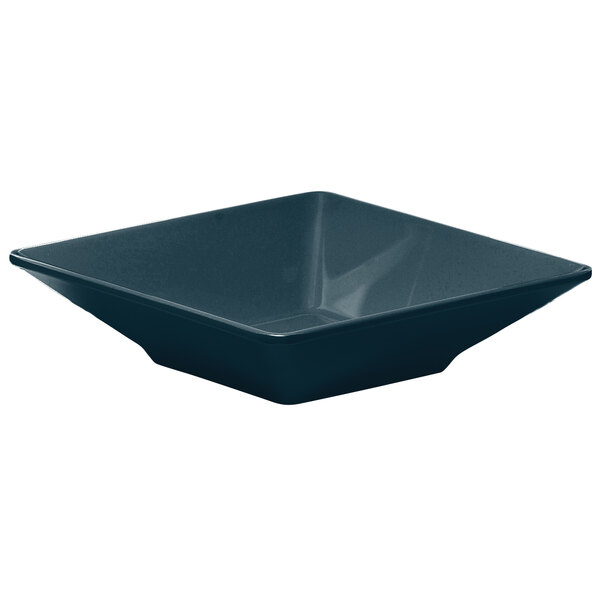 A squared dark blue melamine bowl with a white background.