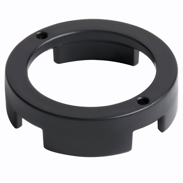 A black plastic circular spacer seal with holes.