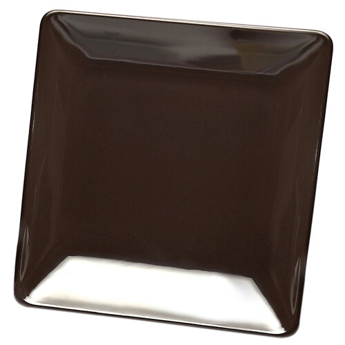 A brown square plate with a white border.