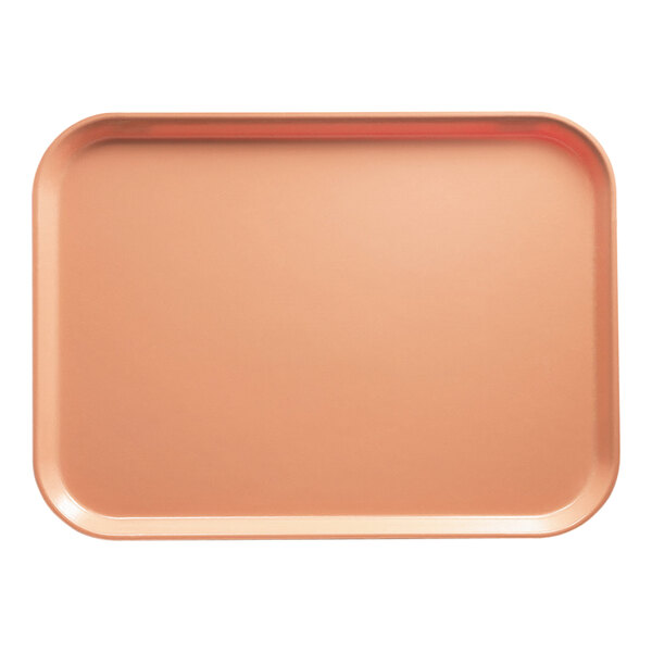 A rectangular dark peach Cambro tray on a counter.