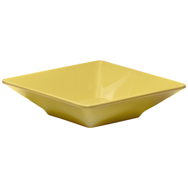 An Elite Global Solutions yellow square melamine bowl.