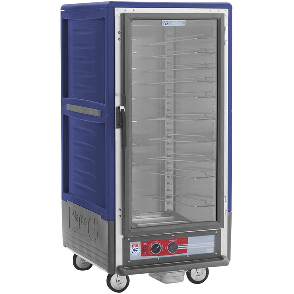 A blue and silver Metro C5 heated holding cabinet on wheels with a clear door.