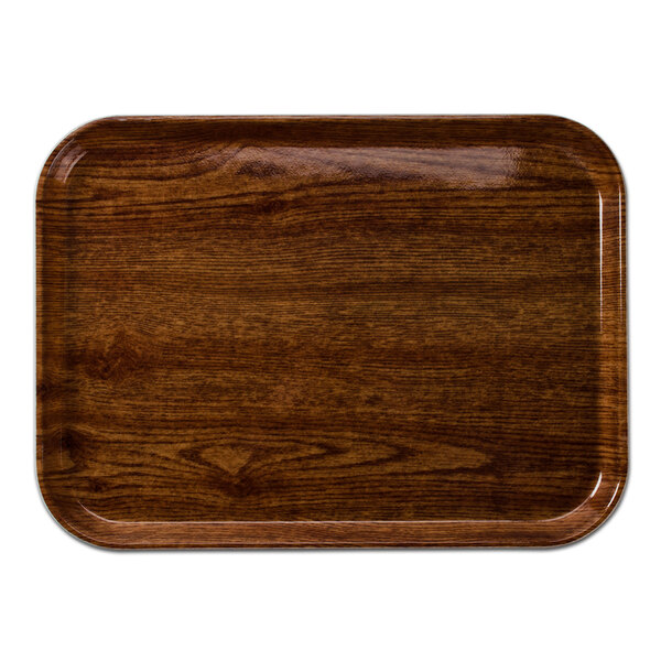 A rectangular Cambro fiberglass tray with a Country Oak finish.