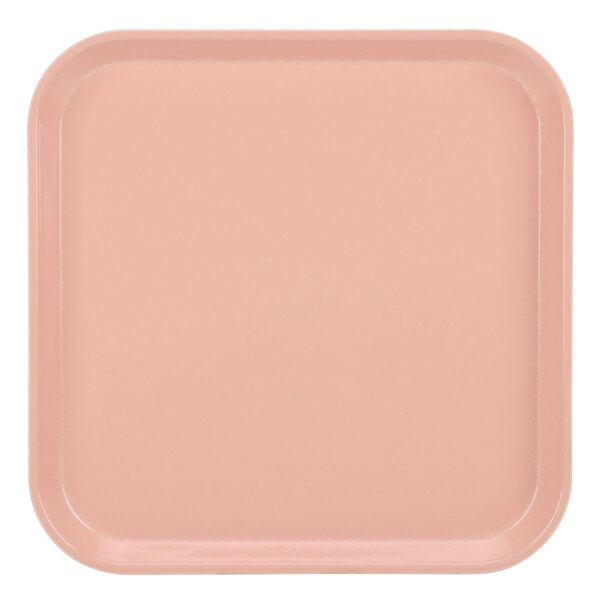 A square pink tray with a white background.