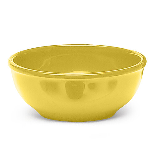 A yellow Elite Global Solutions melamine bowl on a white surface.