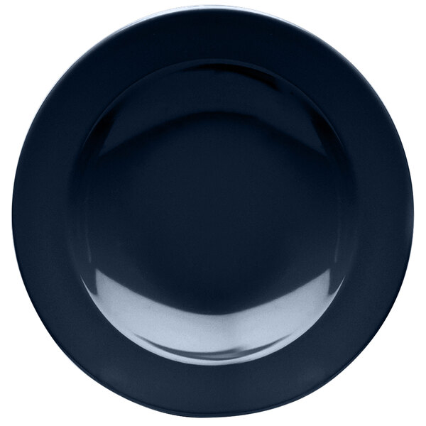 A close up of a dark blue Elite Global Solutions melamine pasta bowl with a black circle in the center.